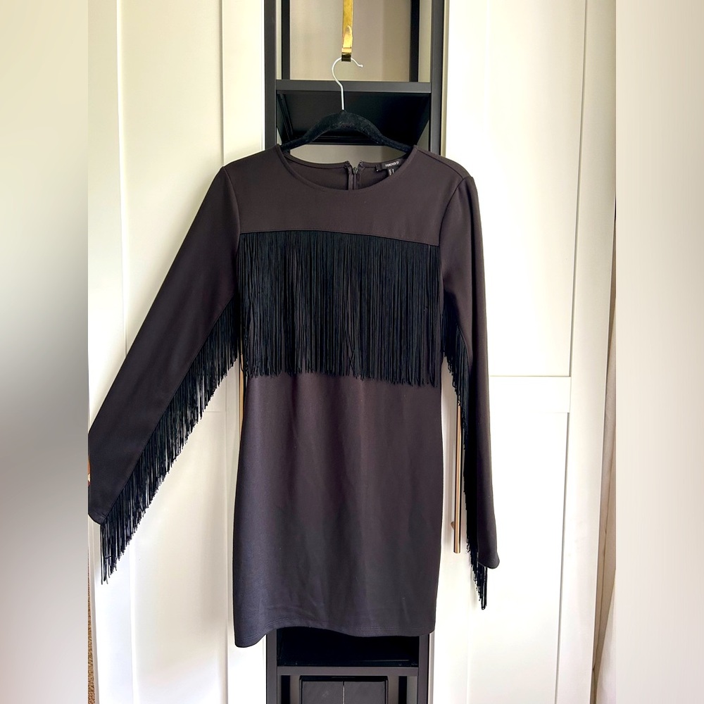 Black dress with fringes. By Forever 21 size M.